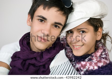 Portrait of a happy couple in hug, winter style