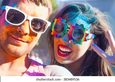 Portrait Of Happy Couple In Love On Holi Color Festival