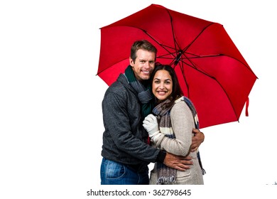 Portrait of happy couple with red umbrella against white backgorund - Powered by Shutterstock