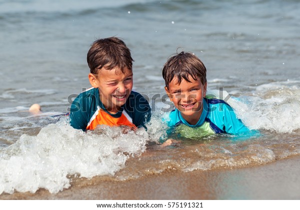 Portrait Happy Cute Boys Swimming Sea Stock Photo (Edit Now) 575191321