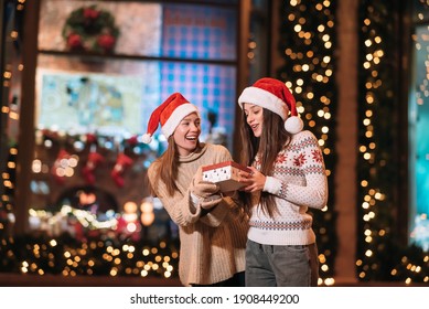 Portrait of happy cute young friends hugging each other - Powered by Shutterstock