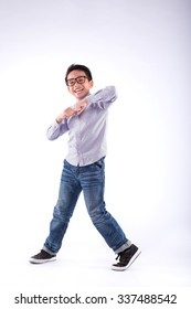 Portrait Of Happy Dancing Asian Kid, Isolated On White