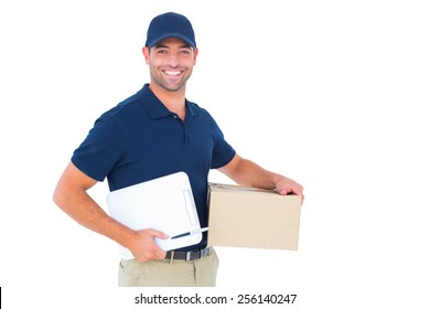Portrait of happy delivery man with cardboard box and clipboard on white background
