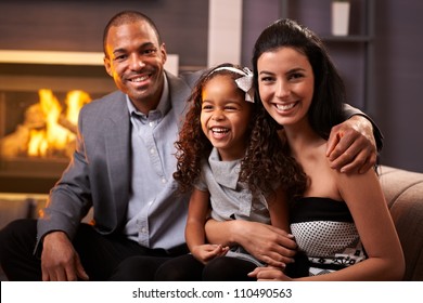 Portrait Of Happy Diverse Family At Home, All Smiling.