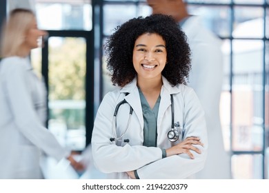 Portrait Of Happy Doctor With Smile In A Hospital Ward With Motivation And Success In The Medical Industry. African American Healthcare Expert Or Worker Proud And Confident In Help Make A Difference