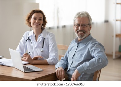 Portrait of happy elderly Caucasian male patient feel satisfied with good quality service in clinic. Smiling mature man excited with consultation with female doctor in hospital. Geriatric concept.