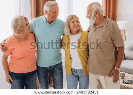 Similar – Image, Stock Photo Hallig Gröde | Senior citizen stands in the calm North Sea at low tide and raises her hands to the sky