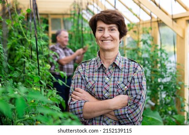 Portrait of happy elderly woman posing in - Powered by Shutterstock