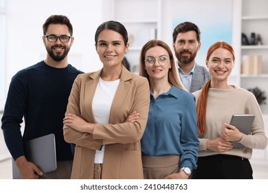 Portrait of happy employees in office. Team work - Powered by Shutterstock