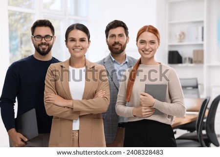 Portrait of happy employees in office. Team work