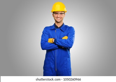 Portrait Of Happy Engineer Isolated On Grey Background