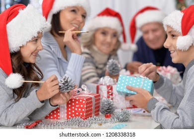 Portrait Of A Happy Family Celebrating Chrismas