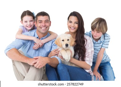 Portrait Of Happy Family With Cute Dog Over White Background