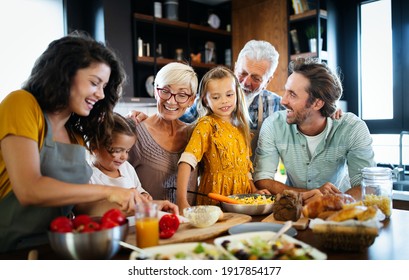 Portrait of happy family in kitchen at home - Powered by Shutterstock