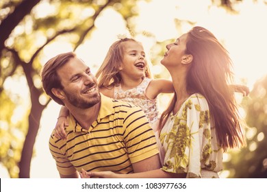 Portrait if happy family in nature. 