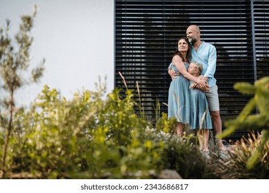 Portrait of a happy family spending time together outdoors - Powered by Shutterstock