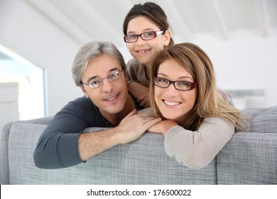 Portrait Of Happy Family Wearing Eyeglasses