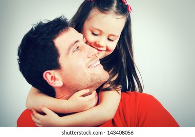 Portrait Of A Happy Father And A Beautiful Little Girl