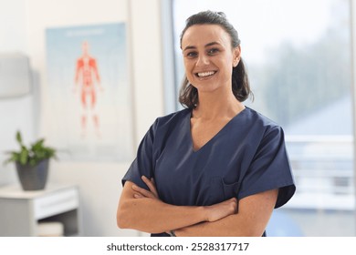 Portrait of happy female caucasian physiotherapist wearing scrubs at hospital. Hospital, physiotherapy, work, medicine and healthcare, unaltered. - Powered by Shutterstock