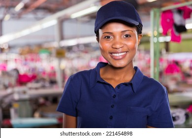 Portrait Of Happy Female Clothing Factory Worker