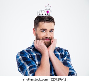 Portrait Of A Happy Feminine Man In Queen Crown Standing Isolated On A White Background And Looking At Camera