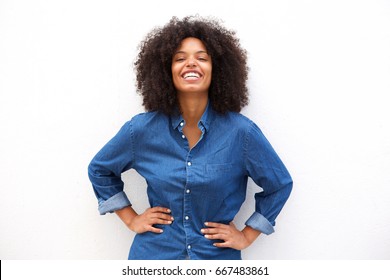 Portrait of happy friendly woman smiling on isolated white background