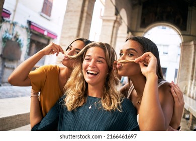 Portrait Of A Happy Girls Making Jokes