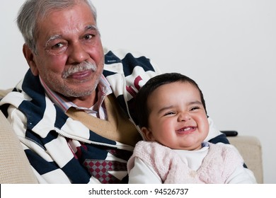 Portrait Of Happy Grandfather And Grand Daughter, Grandfather And Grandchild