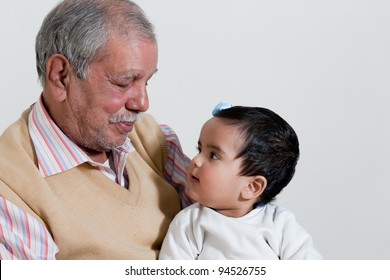 Portrait Of Happy Grandfather And Grand Daughter, Grandfather And Grandchild