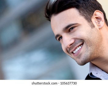 Portrait Of A Happy Handsome Man Smiling