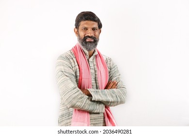 Portrait of an happy Indian bearded man in rural India concept. Funky expressions white background.  - Shutterstock ID 2036490281