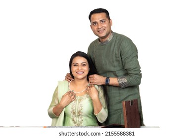 Portrait Of Happy Indian Couple Celebrating 