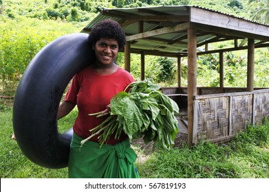 Portrait Of Happy Indigenous Fijian Woman Looking At Camera And Smiling In Fiji .Real People Copy Space