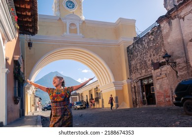 Portrait Of A Happy Indigenous Girl With Her Typical Costume In A Colonial City.