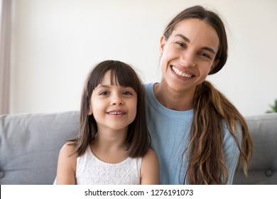 Portrait Of Happy Kid Girl And Smiling Mother Looking At Camera Webcam Making Online Call, Cute Child With Mom Vloggers Recording Video Blog Or Vlog Together, Mommy And Little Daughter Headshot