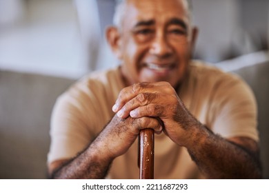 Portrait Of A Happy, Kind Black Senior Man Hands With Wrinkles, Holding A Walking Stick And Smiling In A Retirement Home Sitting On Outside Relaxing And Waiting In The Queue