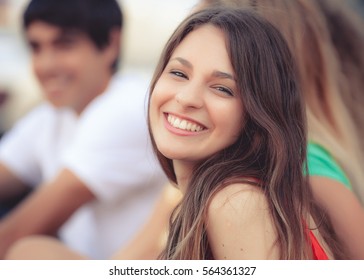 Portrait Of A Happy Latin Girl On The Street