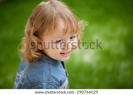 Similar – Small child with long blond hair enjoying of a sunny day