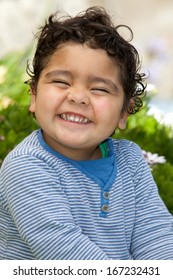 portrait of happy little boy outdoors