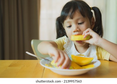 Portrait Happy Little Girl Eating Mango Stock Photo 2139957563 