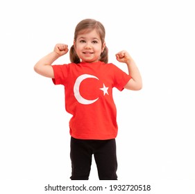 Portrait Of Happy Little Kid, Cute Baby Toddler With Turkish Flag T-shirt. Little Turkish Girl Isolated On White. Patriotic Holiday. Adorable Child Celebrates National Holidays. 