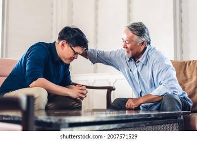 Portrait Of Happy Love Asian Family Senior Mature Father And Young Adult Son Play And Looking Together In Moments Good Time At Home