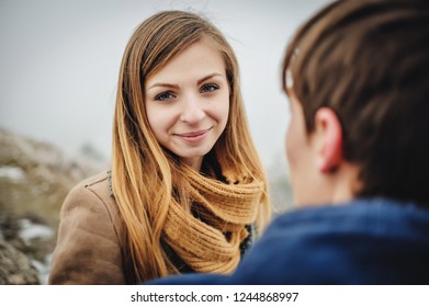 Portrait Of Happy Lovers: Girl And Man Outdoor, Young Sensual Couple In Cold Winter Wather. Happy Winter Holidays.