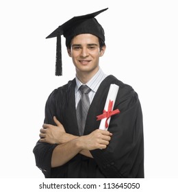 Portrait Of A Happy Male Graduate Holding His Diploma