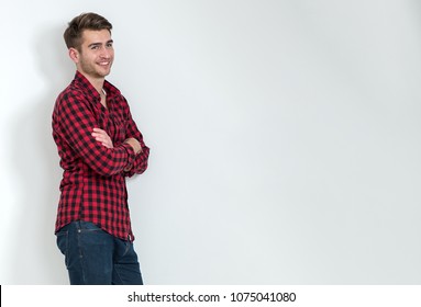 Portrait Of A Happy Man In 20s In Plain Shirt On White Background