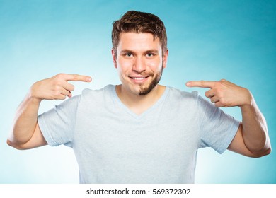 Portrait Of Happy Man With Half Shaved Face Beard Hair. Smiling Handsome Guy On Blue. Skin Care And Hygiene.