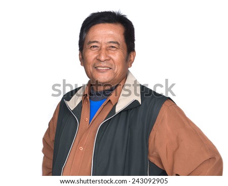 Portrait of happy mature Asian man smiling and looking at camera