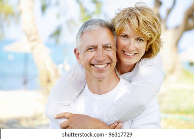 Portrait Of A Happy Mature Couple Outdoors