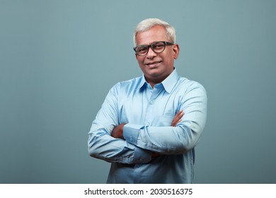 Portrait of a happy mature man of Indian ethnicity 