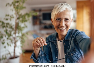 Portrait Of Happy Mature Woman, Taking A Break From Work, At Home.